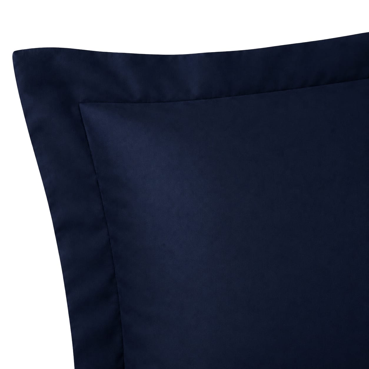 Close-up of the three-inch flange and smooth cotton sateen fabric on a Beddley Navy Blue pillow sham.