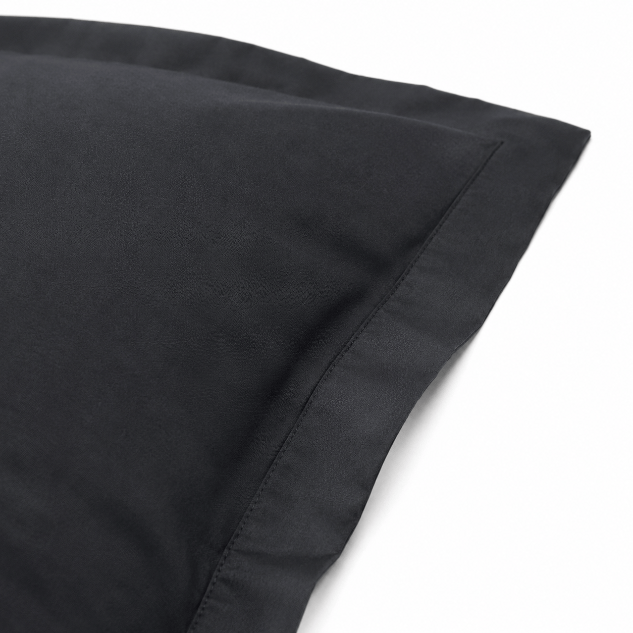 Close-up of Beige cotton sateen pillow sham fabric and stitching