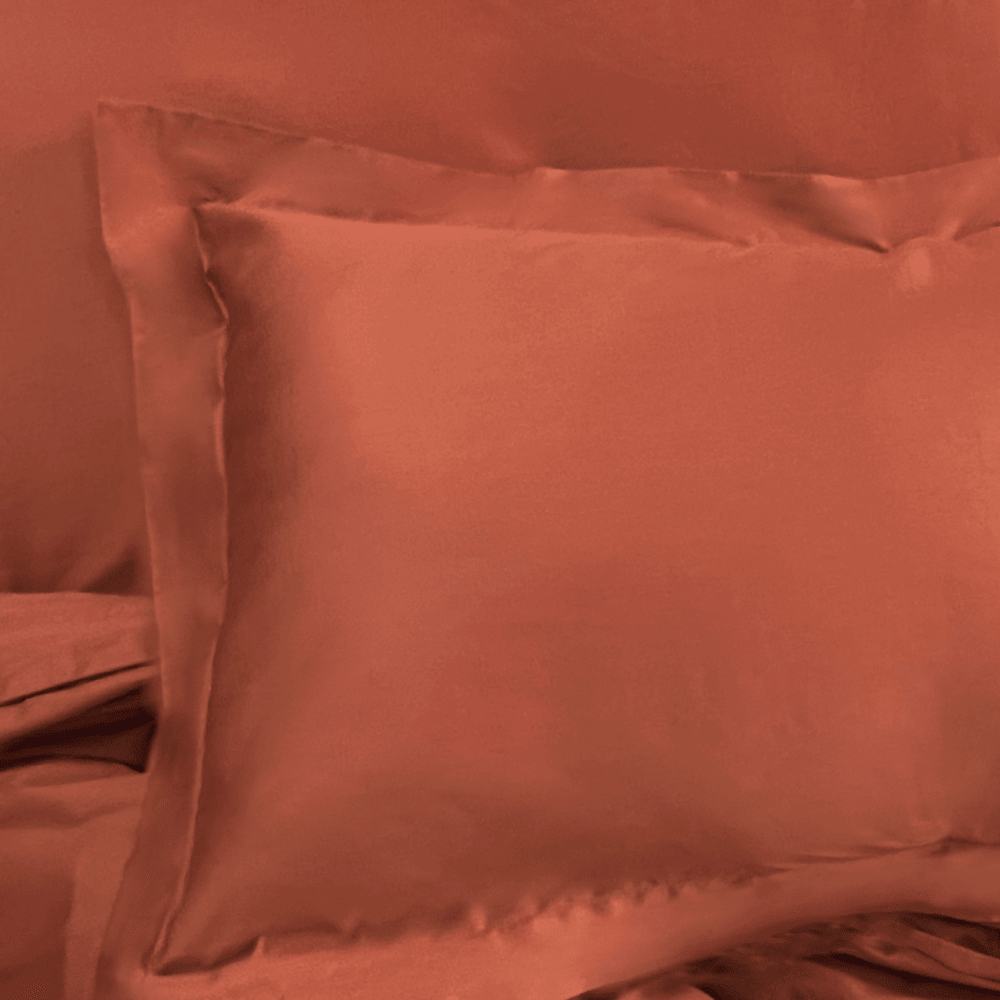 Front view of terracotta pillow sham with flanges on four sides