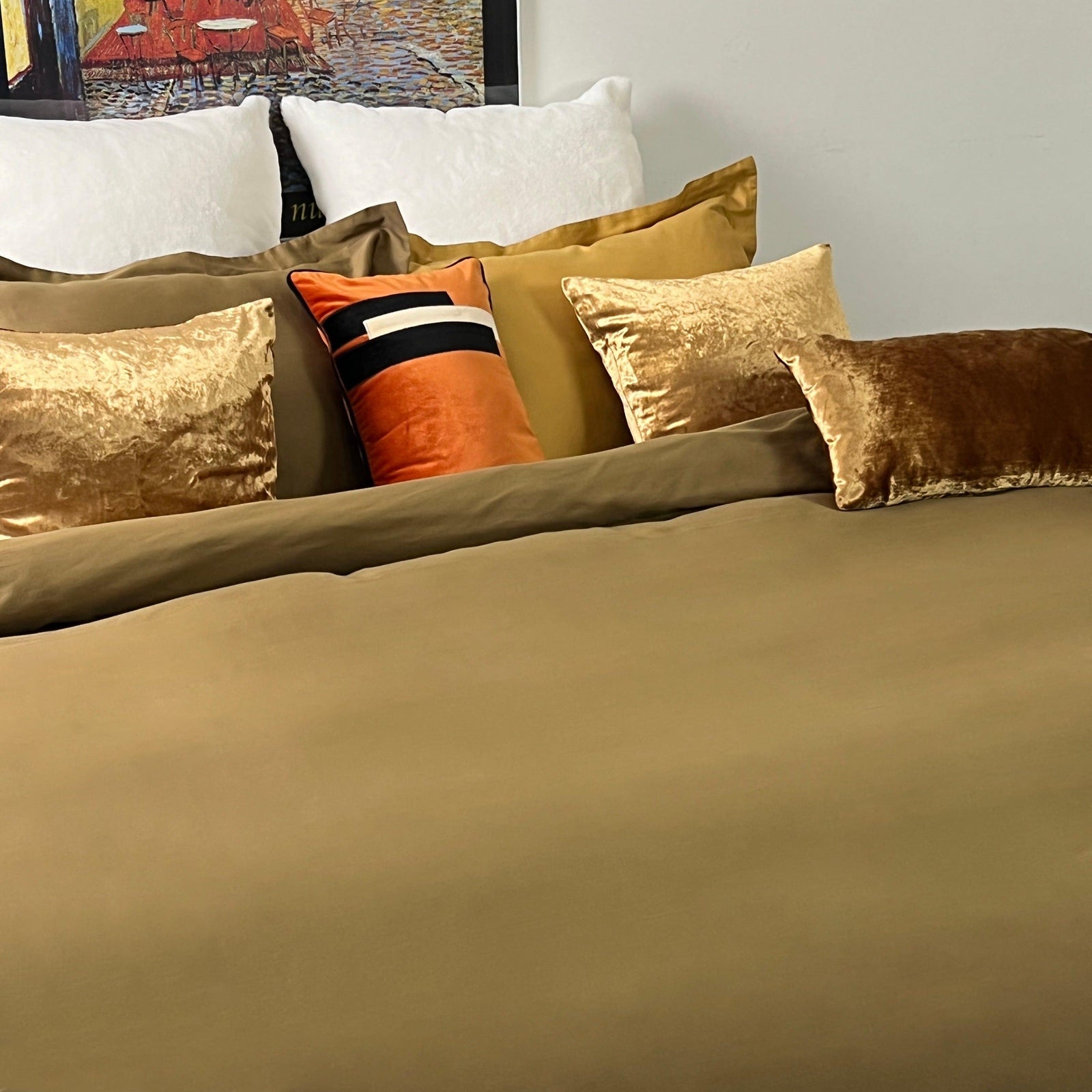 Olive duvet cover on a bed. Designed with a three-sided zipper for easy use.